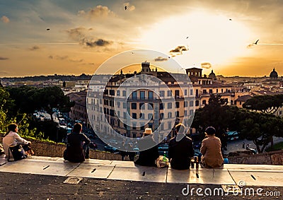 People watching the sunset in Rome