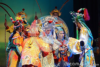 Performer performing traditional Chinese opera on the Chinese ghost festival.