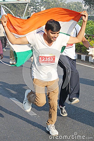 Person holding Indian Flag, Hyderabad 10K Run Event