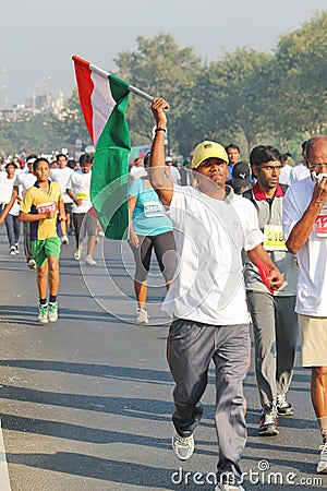 Person holding Indian Flag, Hyderabad 10K Run Event