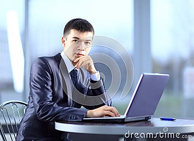 Person Typing on a modern laptop