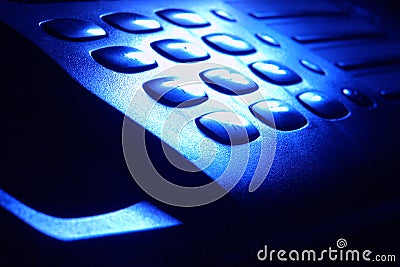 Phone Keypad in Dramatic Blue Light