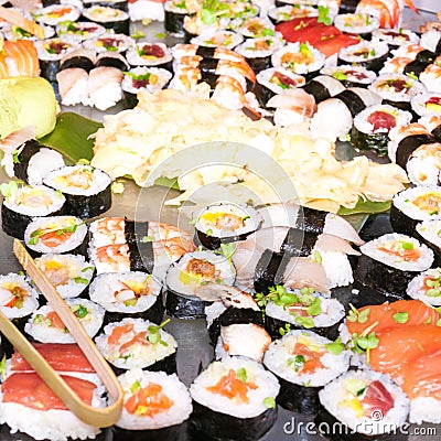 Photo of fresh sushi platter with a lot of variety