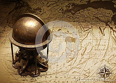 Old globe on map of the world