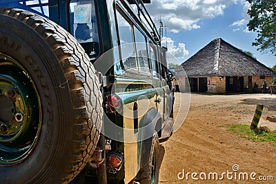 Photo safari game drive with off road vehicle. Mikumi National Park, Tanzania
