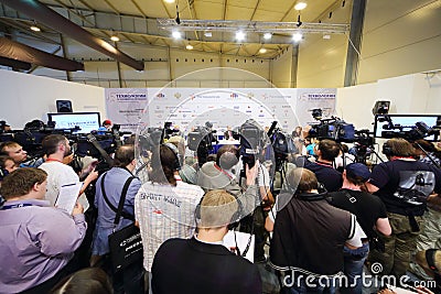 Photographers and journalists at press conference