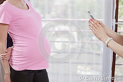 Photographing pregnant women mobile phone