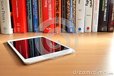 Physics books reflected in Ipad mini screen