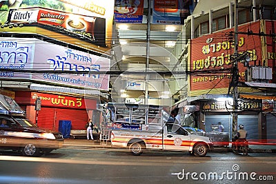 Pick-up truck parks on the street