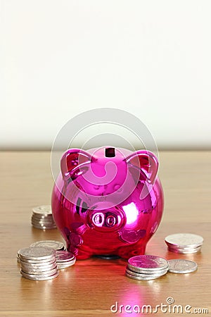 Piggy bank with silver coins