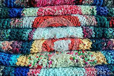 Pile of handmade carpets.