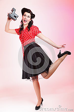 Pin-up girl American style retro woman camera