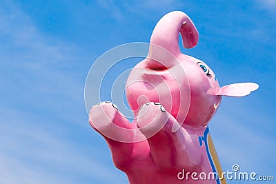 Pink elephant at an amusement park