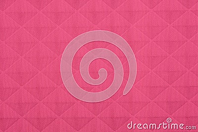 Pink fabric with geometric patterns, a background