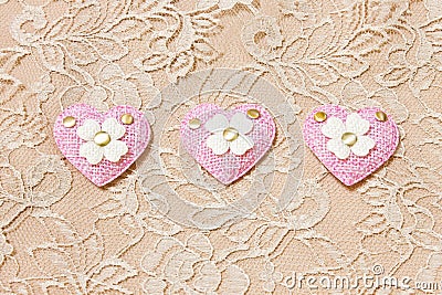 Pink heart on lace background