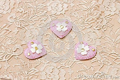 Pink heart on lace background