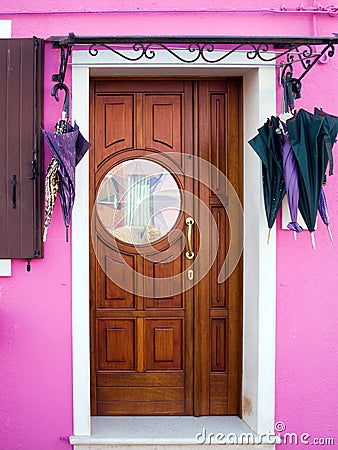 Pink house door with stained glass