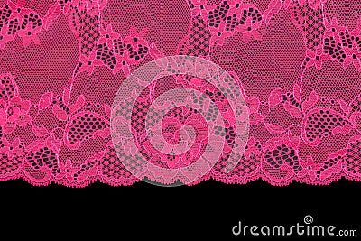 Pink lace over black background