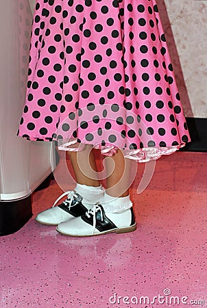 Pink poodle skirt and saddle shoes