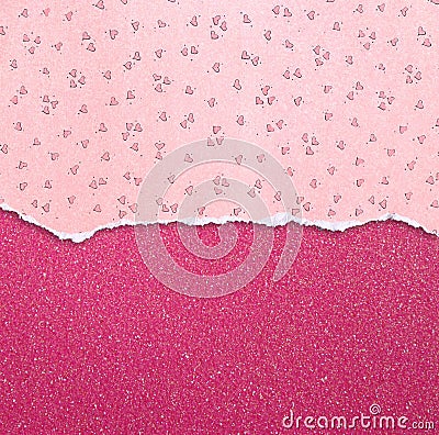 Pink torn paper with hearts pattern over pink glitter background