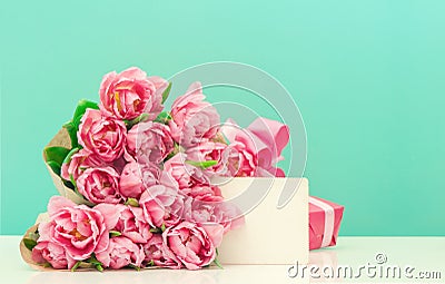 Pink tulip flowers with greeting card