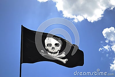 Pirate Flag Against Blue Sky