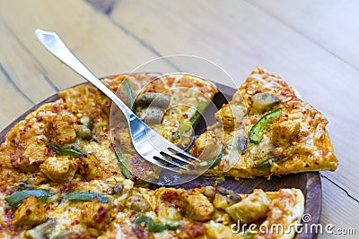 A Pizza Slice in Plate, forks and knife