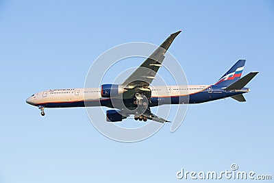 The plane Boing-777-300ER of airline Aeroflot decreases before landing at the Sheremetyevo airport