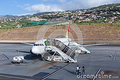 Planes waiting for passengers at the airport of Funchal at Madeira, Portugal