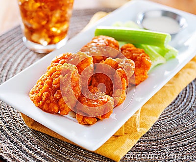 Plate of boneless buffalo flavored chicken wings