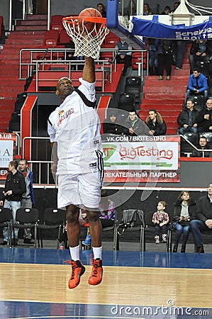 The player throws the ball in the basket