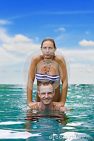 Playful couple in the water