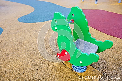 Playground horse with colored rubber flooring