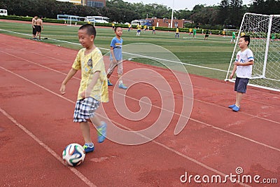 The playing football of boys in shenzhen shekou sports center