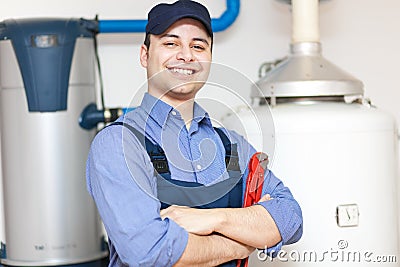 Plumber repairing an hot-water heater