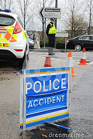 Police accident scene on a busy highway