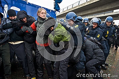 Police Breaking up a Chain of Protesters