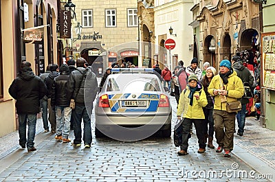 Police car in historical district in Prague city