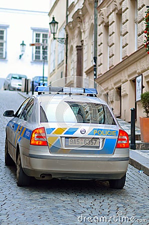 Police car in Prague city patrol on street