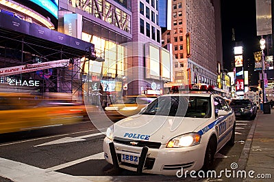 Police car on Times Square New York at night