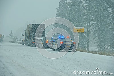 Police cars stop to assist