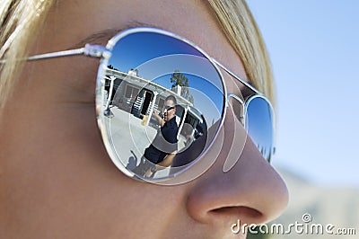 Police Officer Reflected in Sunglasses