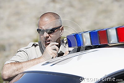Police Officer Using Two Way Radio