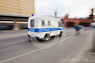 Police van in motion