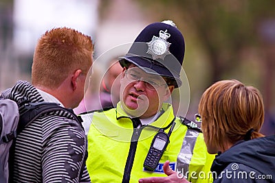 Policeman is advising the people