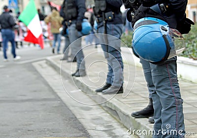 Policeman escorted the fans at the stadium before the football e