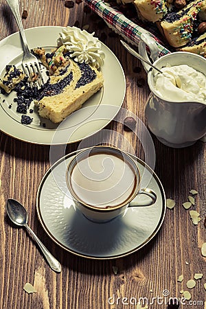 Poppy seed cake and cup of coffee