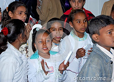 Portait of dark egyptian children smiling gathering at school
