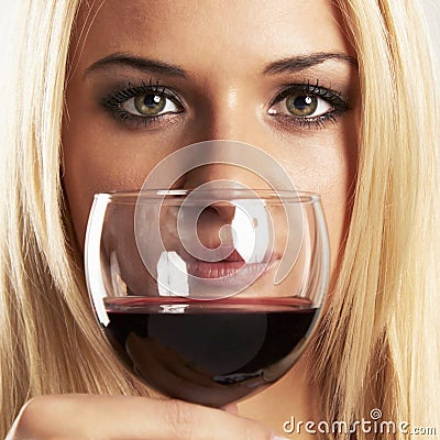 Face of beauty blond woman with red wine