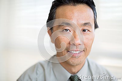 Portrait Of Cancer Specialist Smiling In Hospital